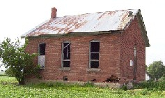 Dilapidated red brick school
