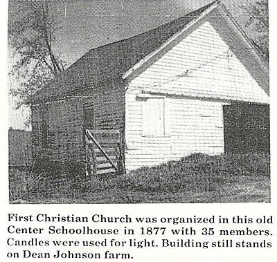 White schoolhouse in use as a shed