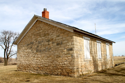 Back of the stone schoolhouse