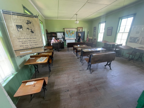 Photo showing the inside of the one room schoolhouse