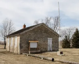 Front of the stone schoolhouse