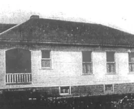 Lots Creek No. 6 schoolhouse with a porch